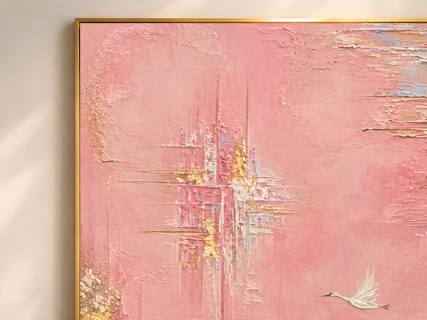 Close-up of pink and gold abstract wall art print showing impasto gold leaf texture, crane bird painting detail

