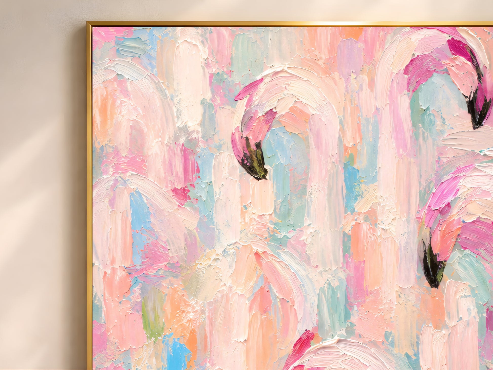 Framed impasto flamingo flock wall art in gold frame leaning against white wall showing full blush pink and pastel flock composition
