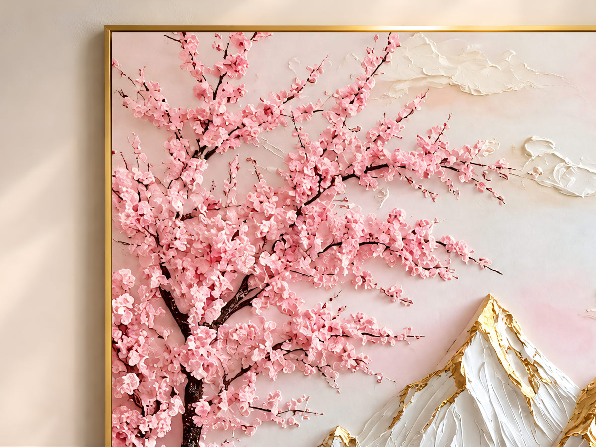Close-up of textured impasto cherry blossom branches in blush pink with a gold-leaf mountain peak in the background