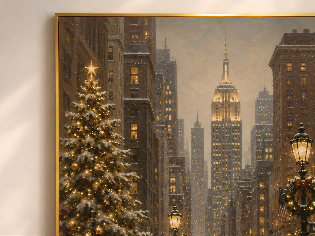 Close-up detail of framed Empire State Building Christmas oil painting print with lit tree and snowy skyline