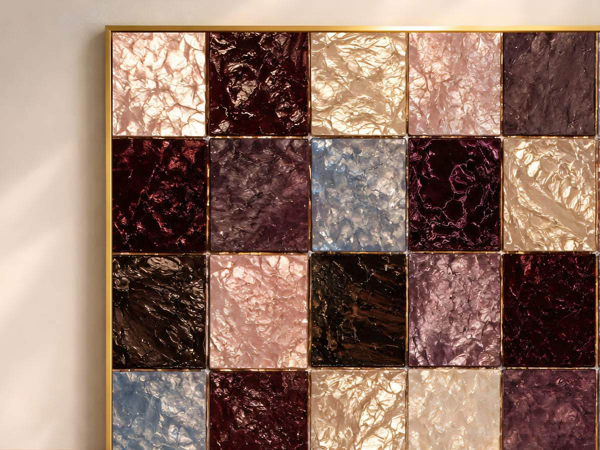 Close-up of the moody checkerboard mosaic showing burgundy, slate blue, and cream jewel tone tiles
