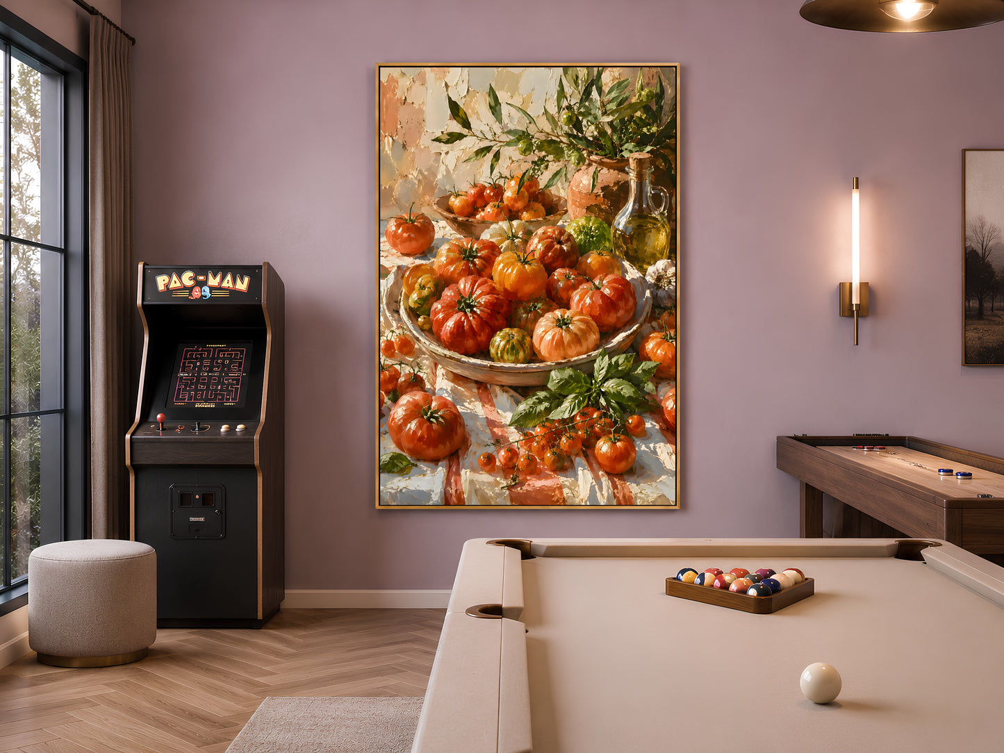 Framed heirloom tomato impasto print hanging in a moody game room with dark walls, ambient lighting, and modern furniture
