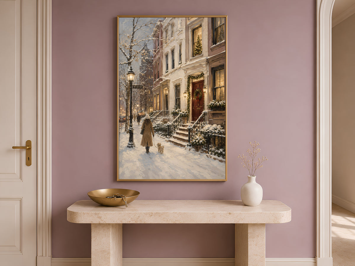 West Village Christmas wall art framed print displayed above console table on mauve pink wall