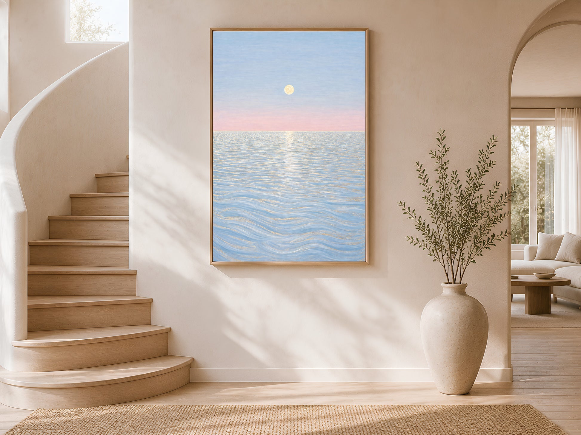 Pastel moon ocean wall art framed on curved staircase wall with potted plant
