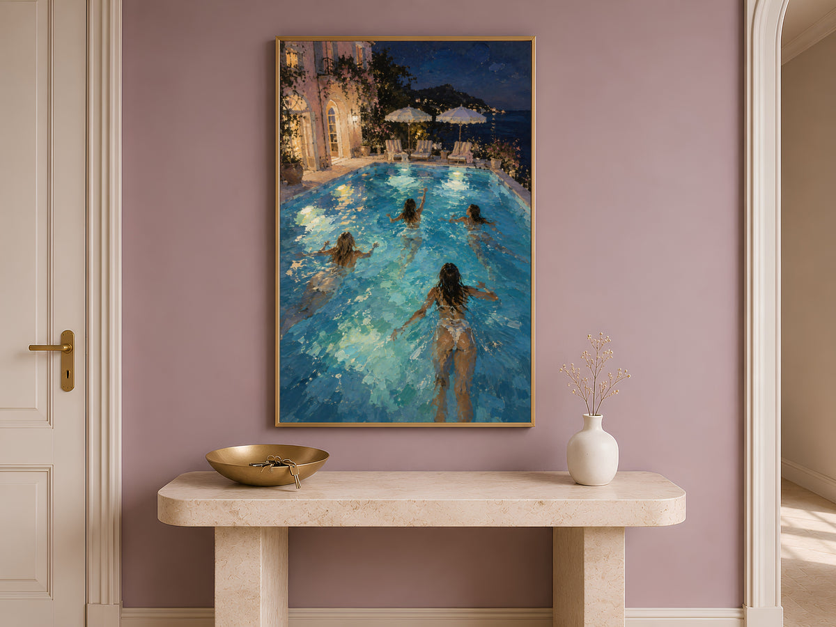 Night swim wall art framed on a wall above an entryway console table with a bowl