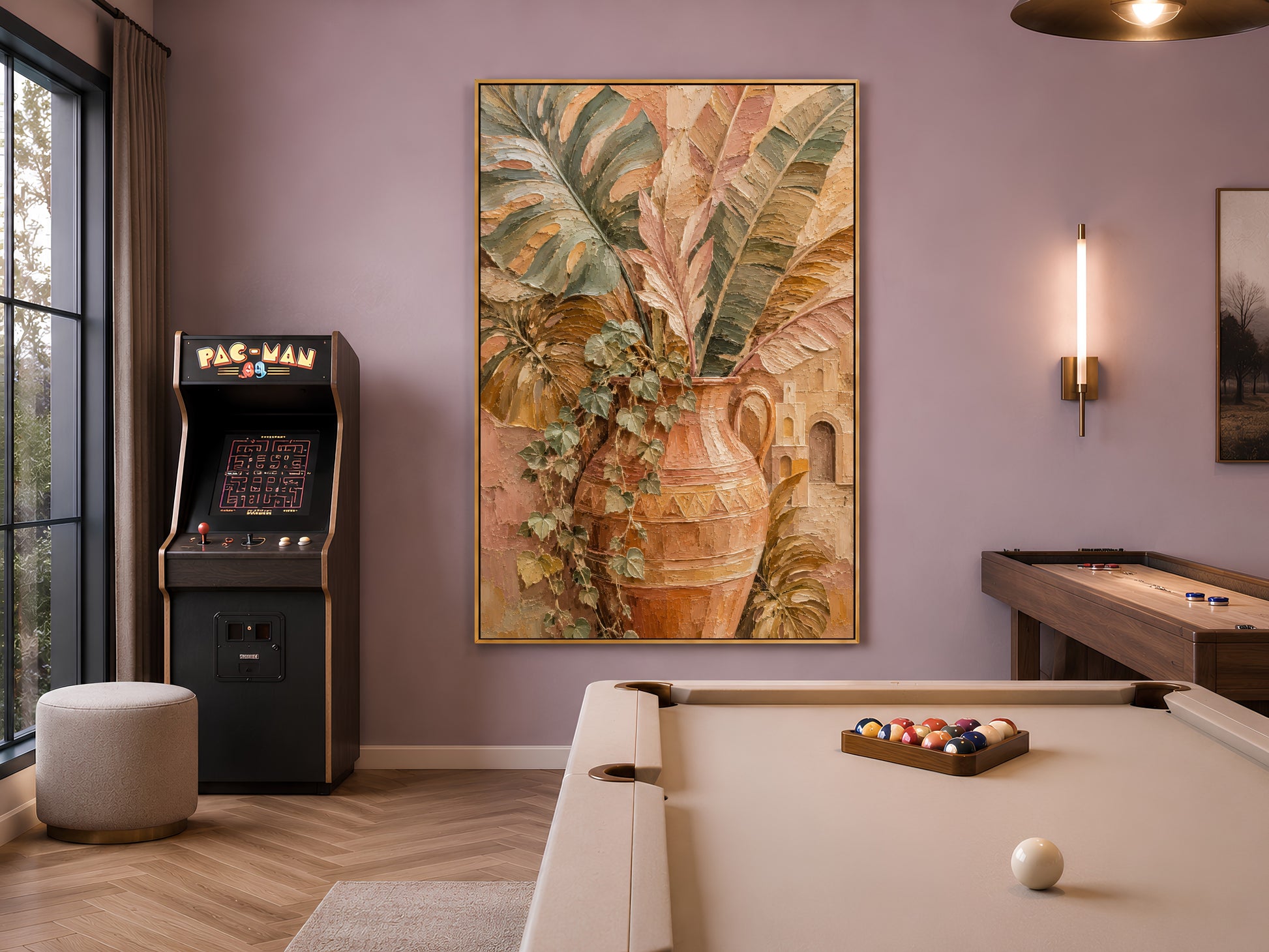 Terracotta botanical vase wall art in gold frame in moody games room with arcade machine and pool table lighting
