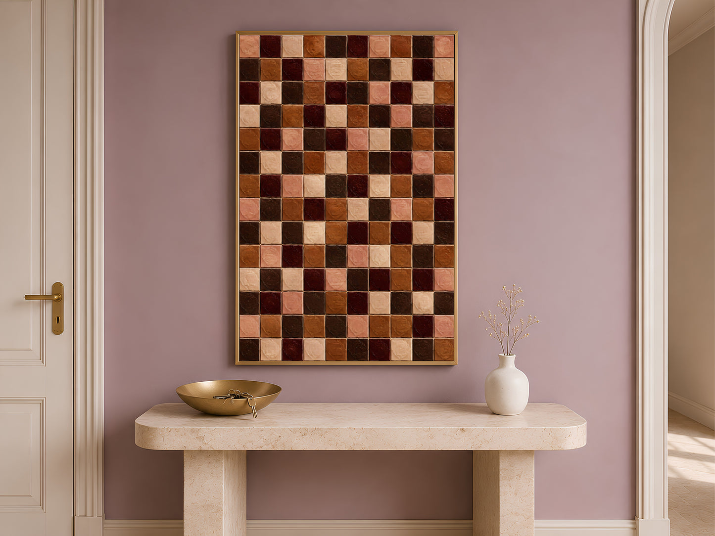 Terracotta and chocolate tile art framed above a console table by a doorway