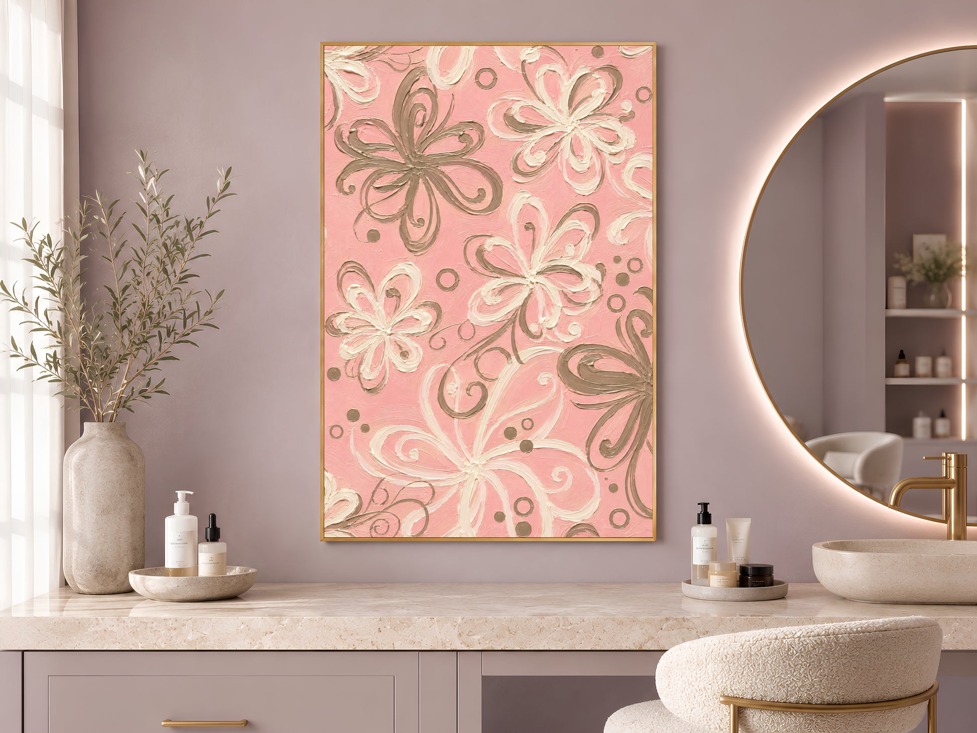 Pink retro swirl floral wall art in gold frame in styled bathroom beside round mirror with neutral accessories
