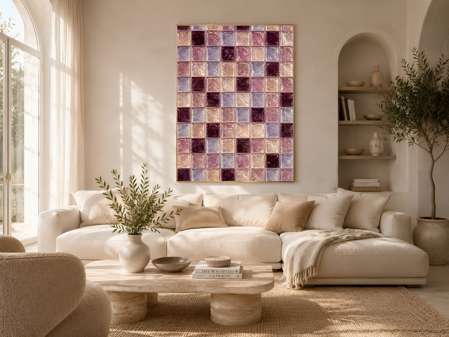 Plum and lavender checkerboard print framed above a cream sofa in a living room