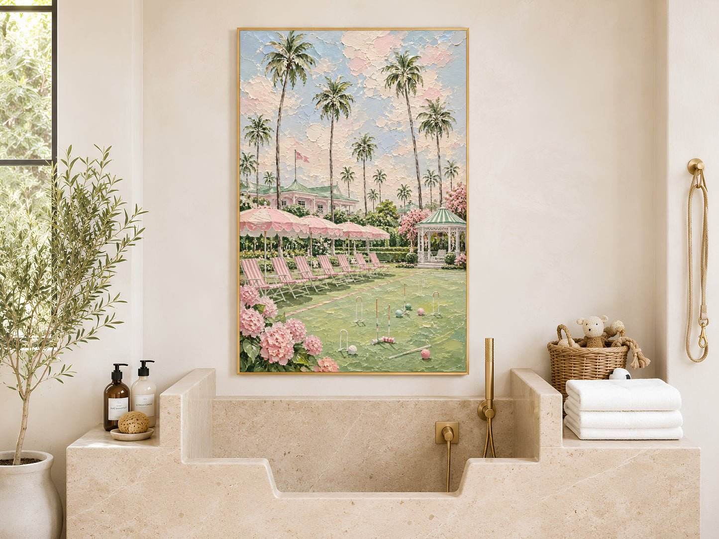 Pink preppy resort painting framed above a stone bathroom tub
