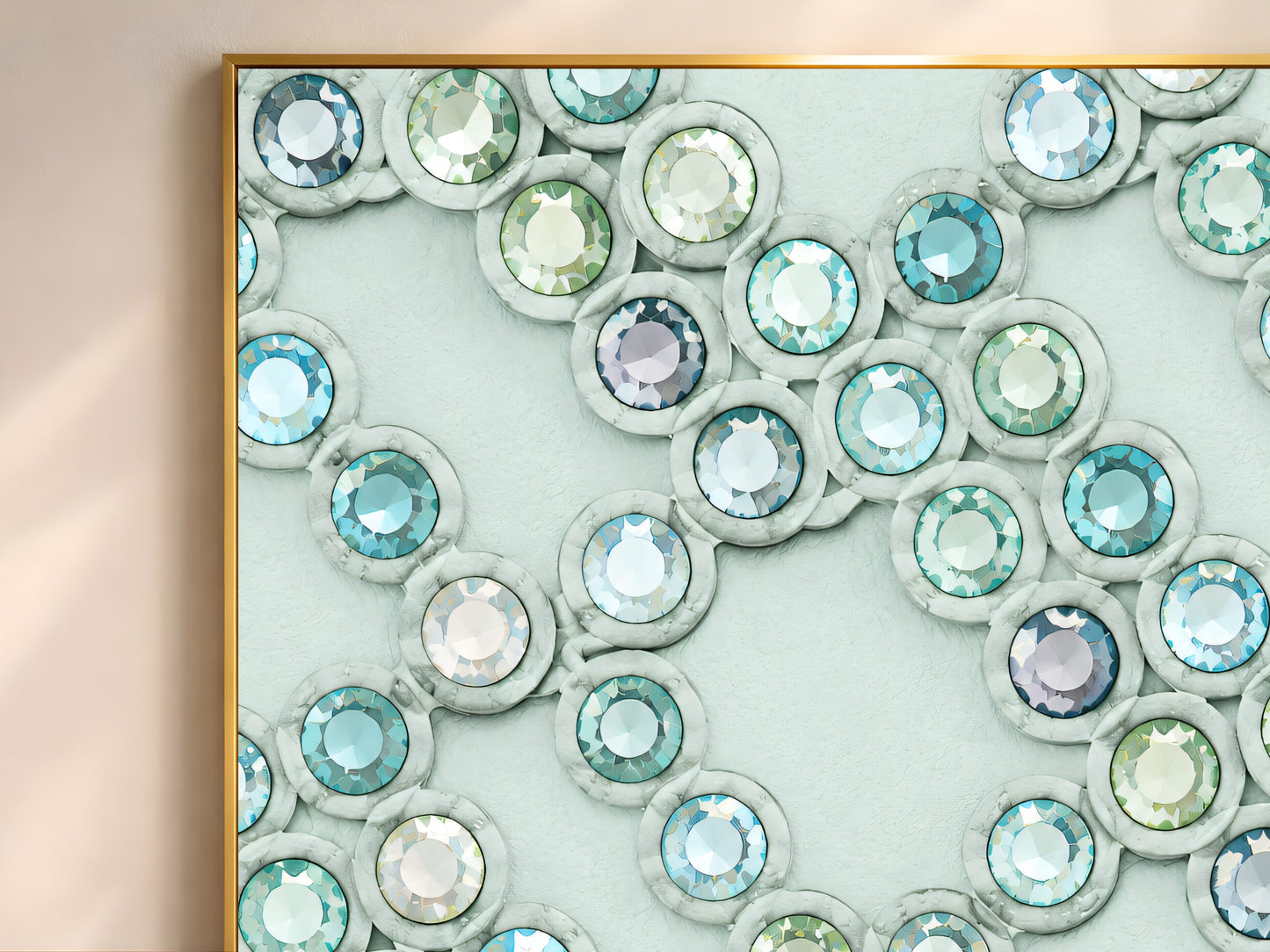 Close-up of crystal gemstone print showing seafoam and aqua faceted rhinestone chevron pattern