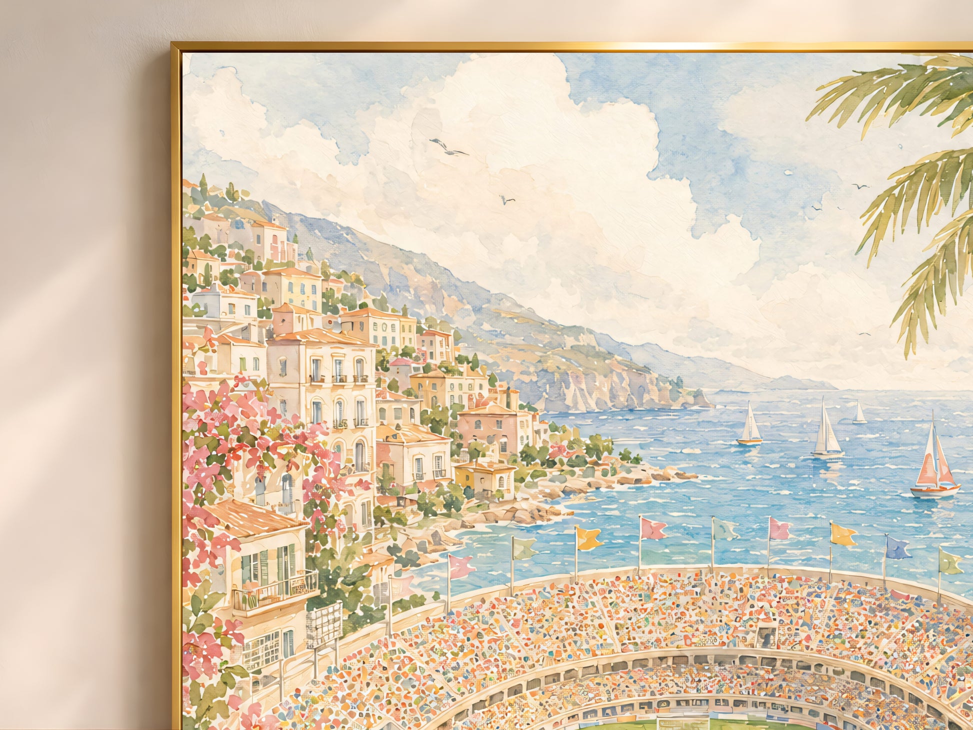 Close-up detail of the watercolor painting, showing the pastel cliffside town, sailboats, and packed stadium terraces in soft brushwork.
