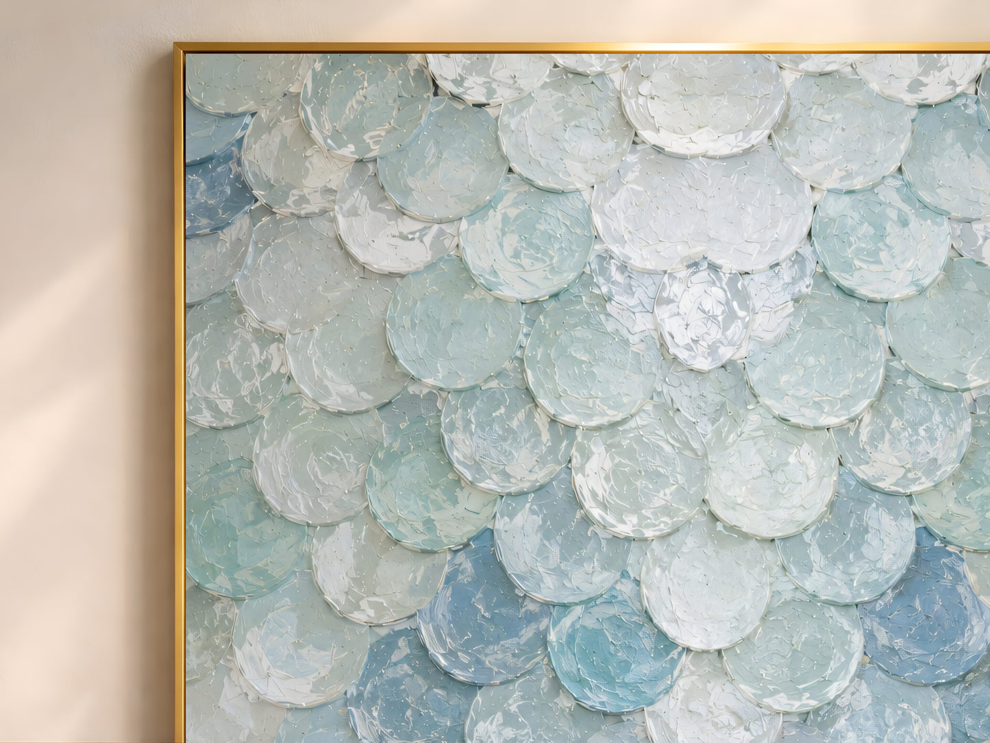 Close-up of seafoam blue capiz shell wall art showing iridescent impasto texture
