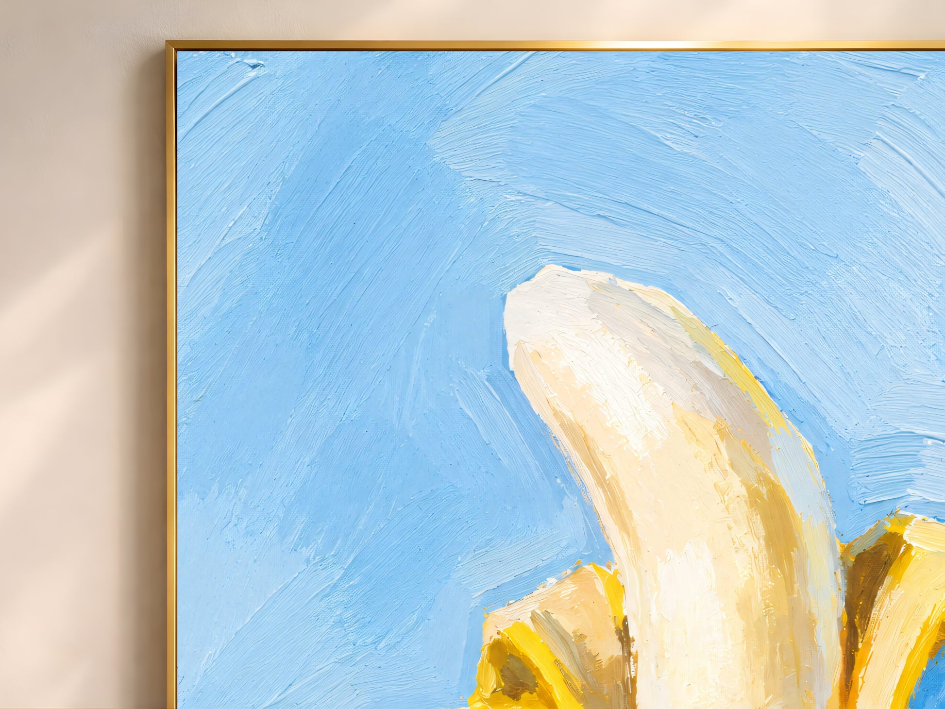 Close-up gold frame corner on banana still life oil painting print, light blue background wall art
