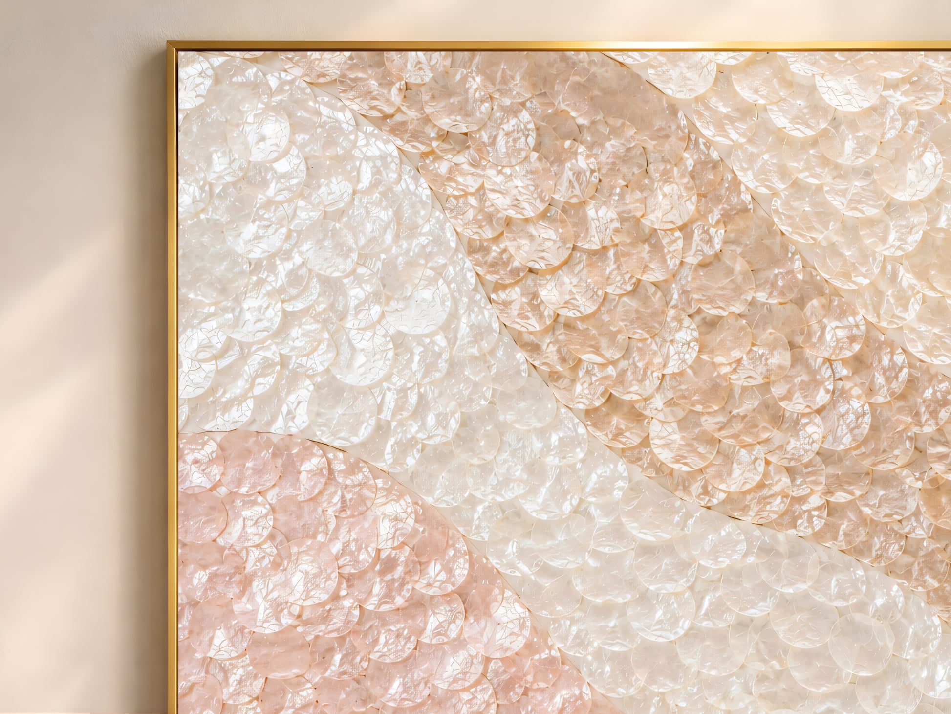 Close-up corner detail of a framed ombre wave mosaic print showing the gold frame edge and scalloped shell tile texture

