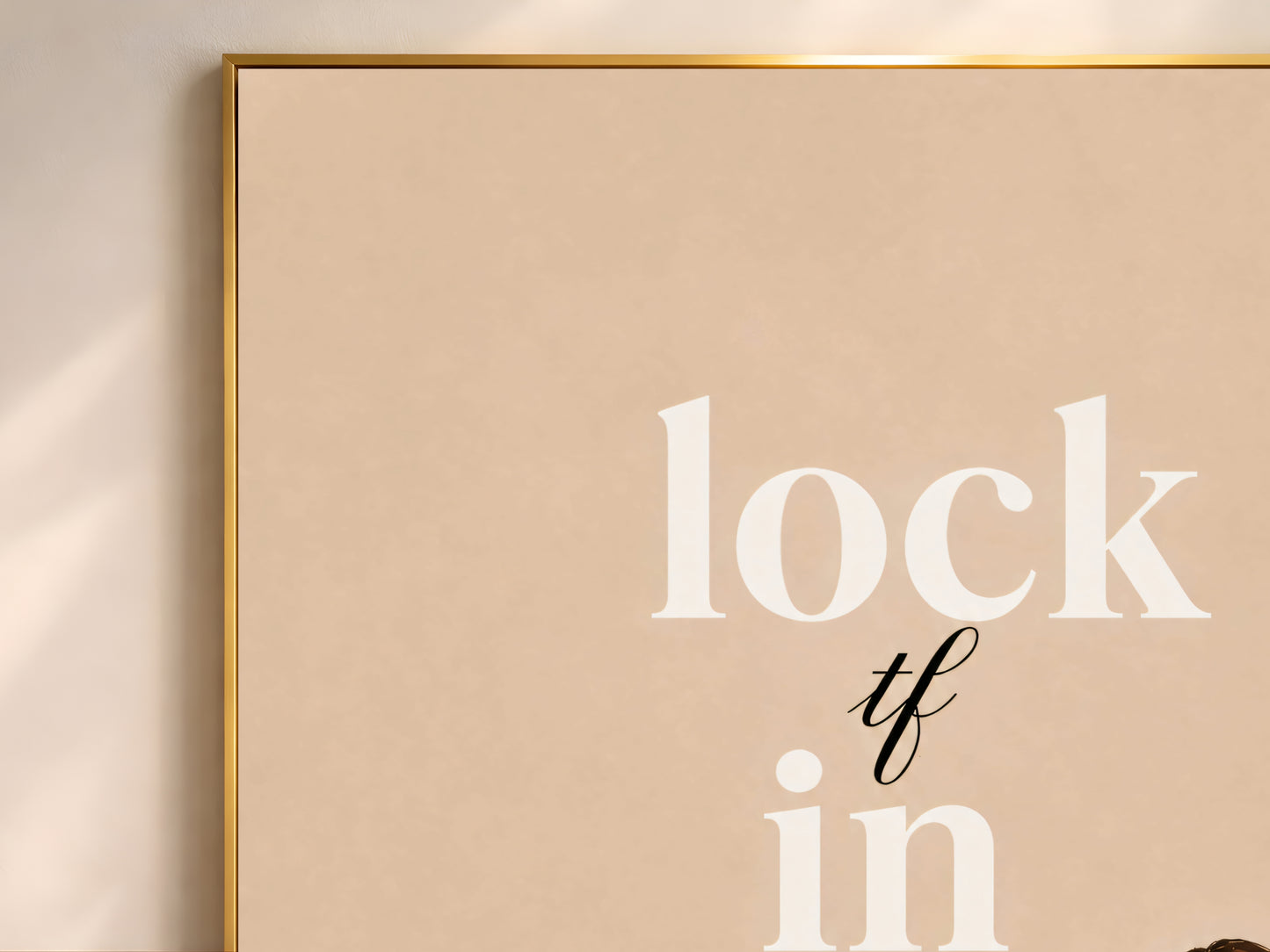 Close-up of Lock TF In quote print in a thin gold frame, girl and dog illustration wall art for bedroom or office decor
