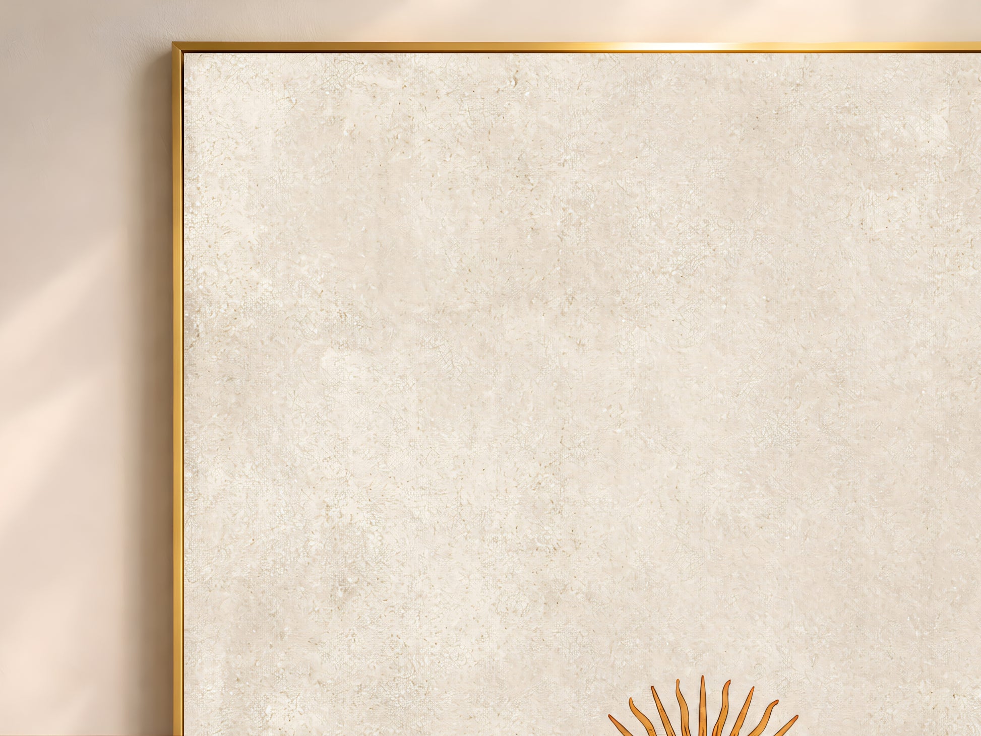 Close-up of vintage sun face wall art in a thin gold frame, minimalist celestial print on neutral limewash texture