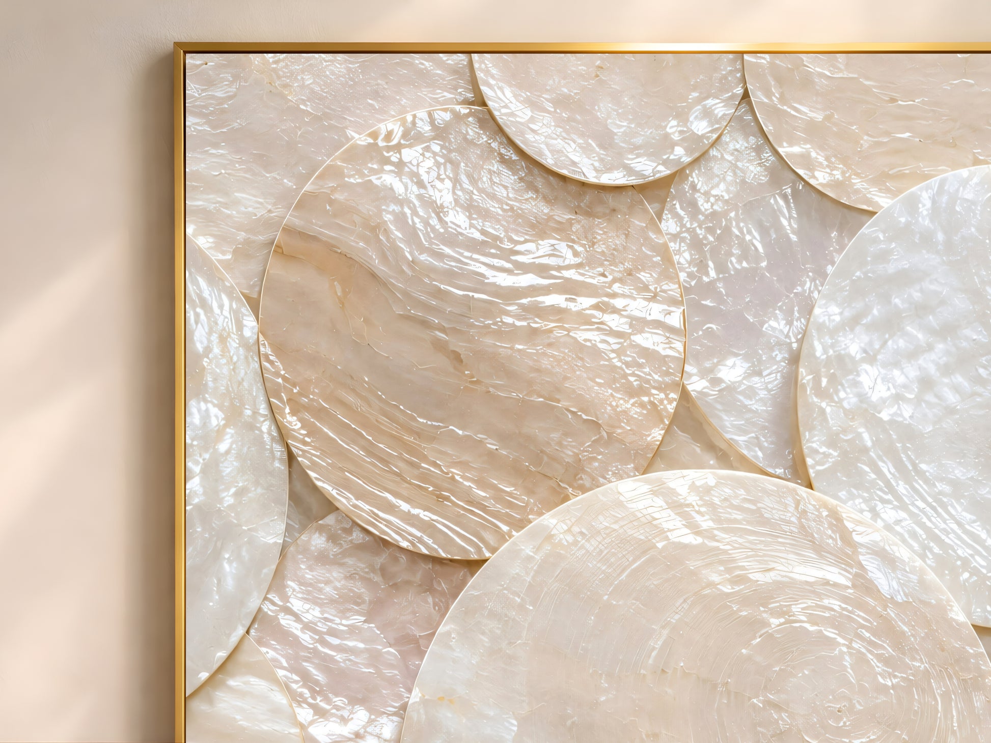 Close-up corner detail of a framed capiz shell mosaic print showing the gold frame edge and iridescent shell texture
