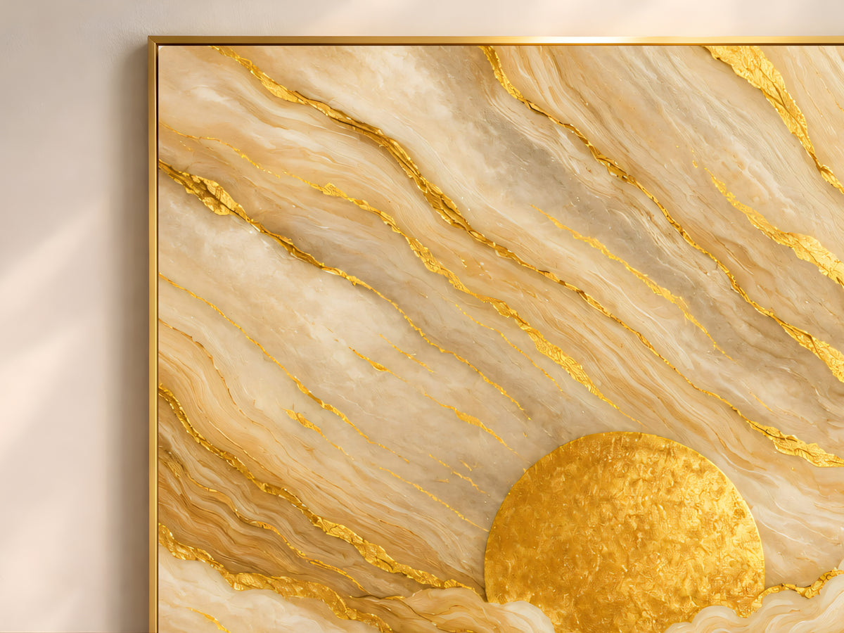 Close-up of gold marble abstract wall art, rich gold veining and sunrise disc in a luxury cloud painting