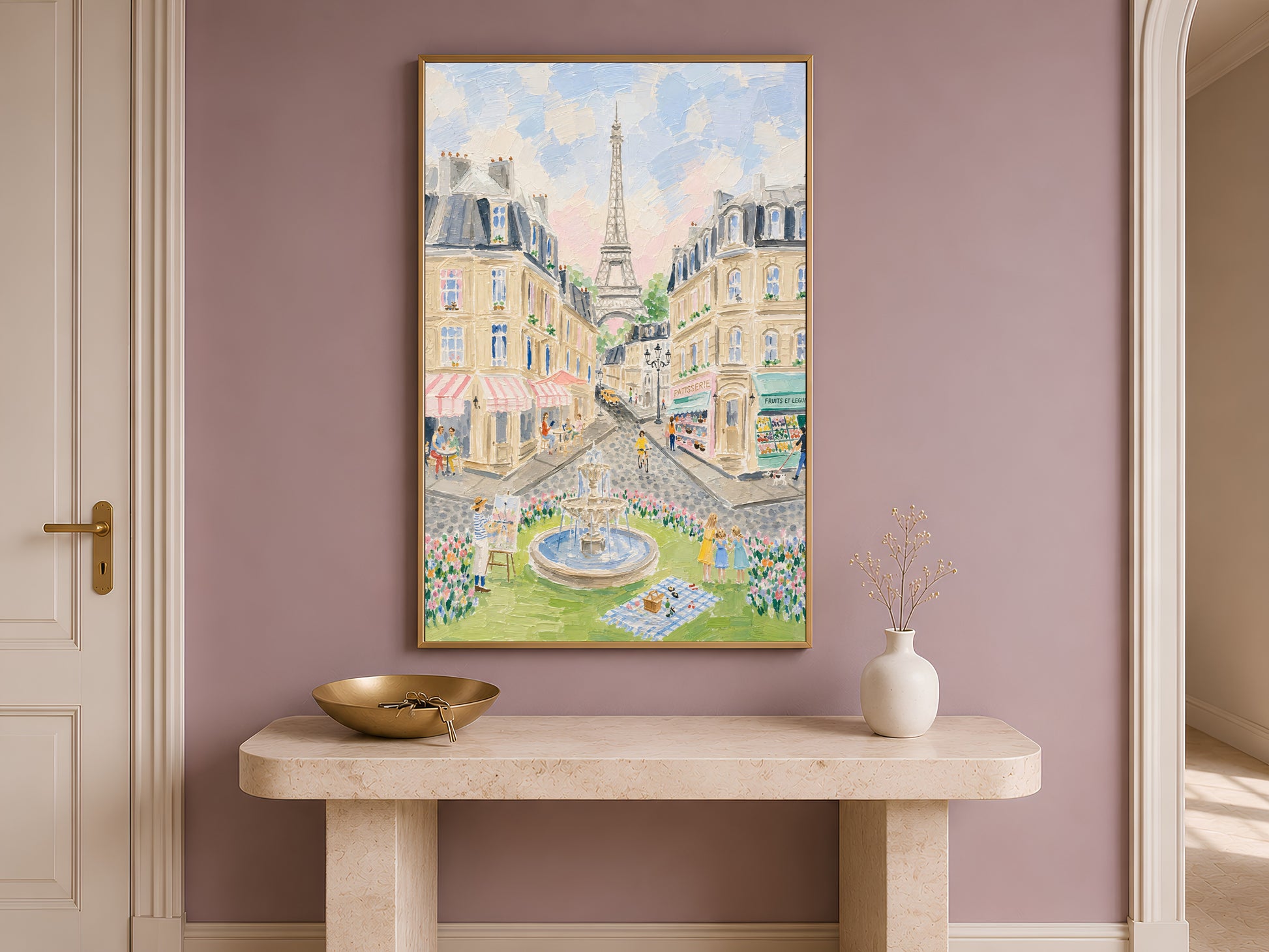 Impasto Paris street scene wall art in a gold frame above a travertine console with a cream vase against a dusty mauve wall in a warm minimal entryway
