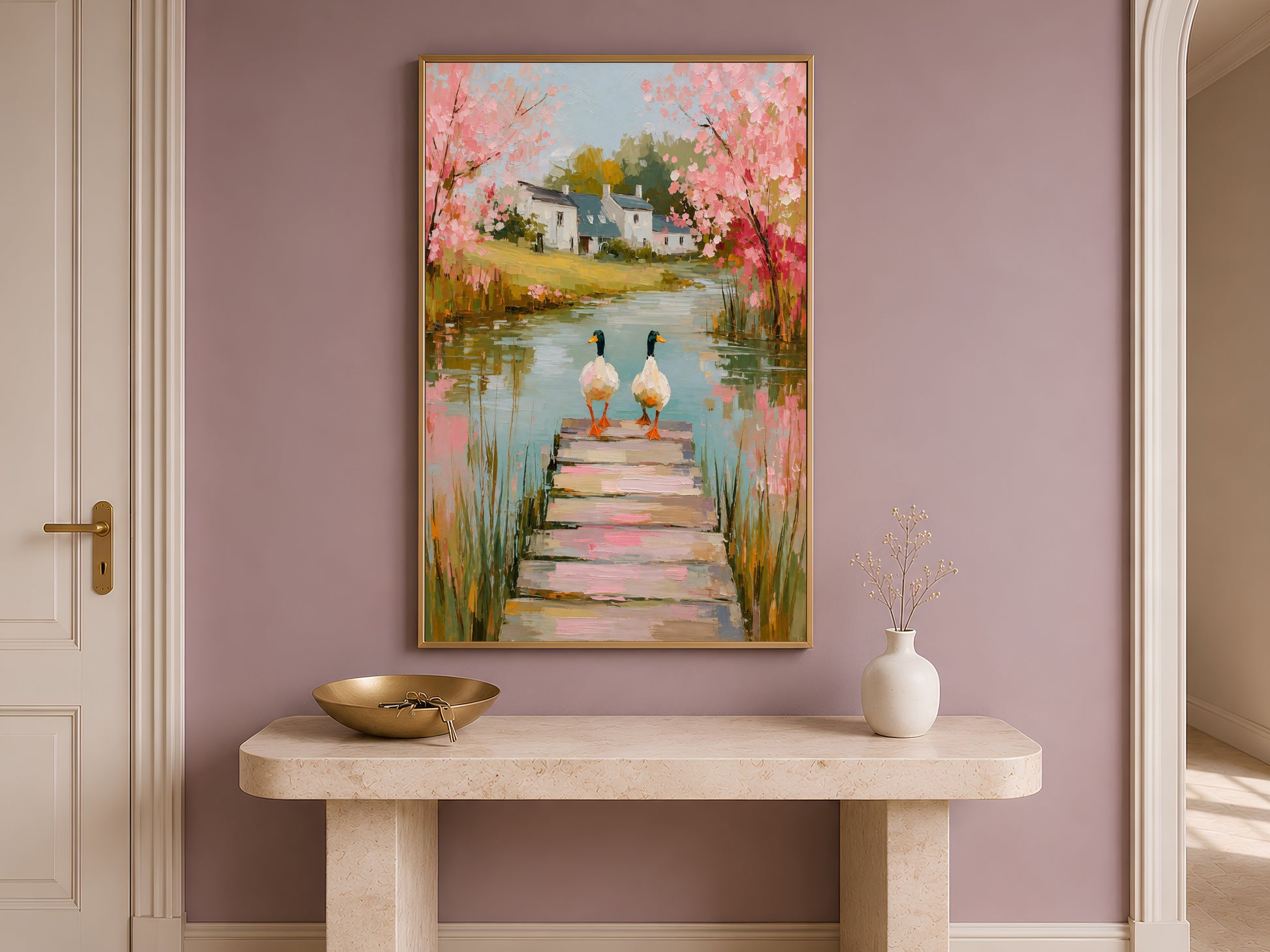 Cherry blossom pond print framed above a dresser in a spa-style bathroom vanity nook