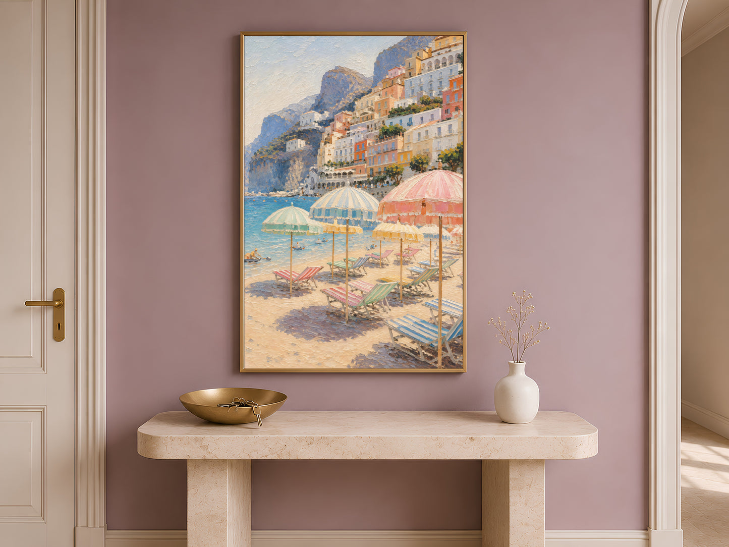 Framed Positano print on a console table in a mauve entryway