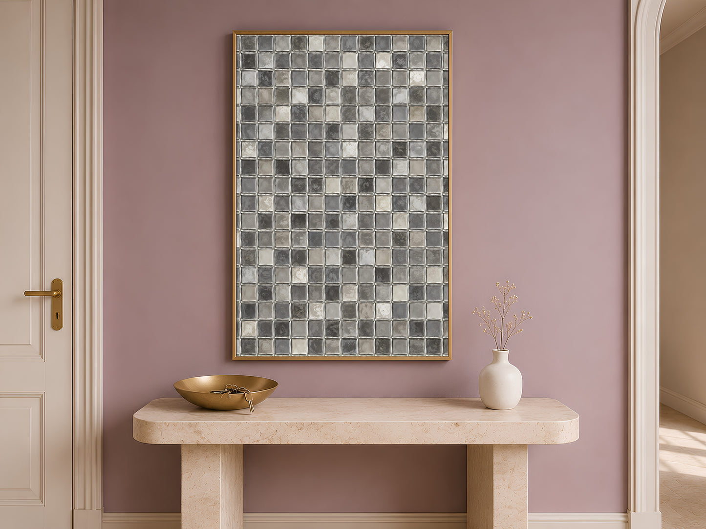 Grey mosaic wall art framed above a wooden entryway console table near a doorway
