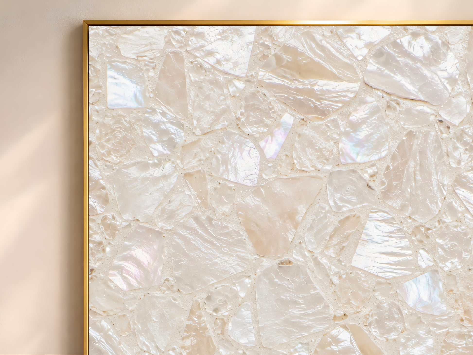 Close-up of the iridescent mother of pearl terrazzo print showing fractured shell fragments in a thin gold frame.