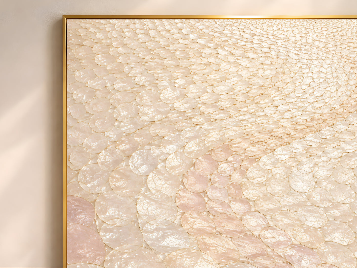 Blush capiz shell wall art in wide gold frame, pearl mosaic texture closeup
