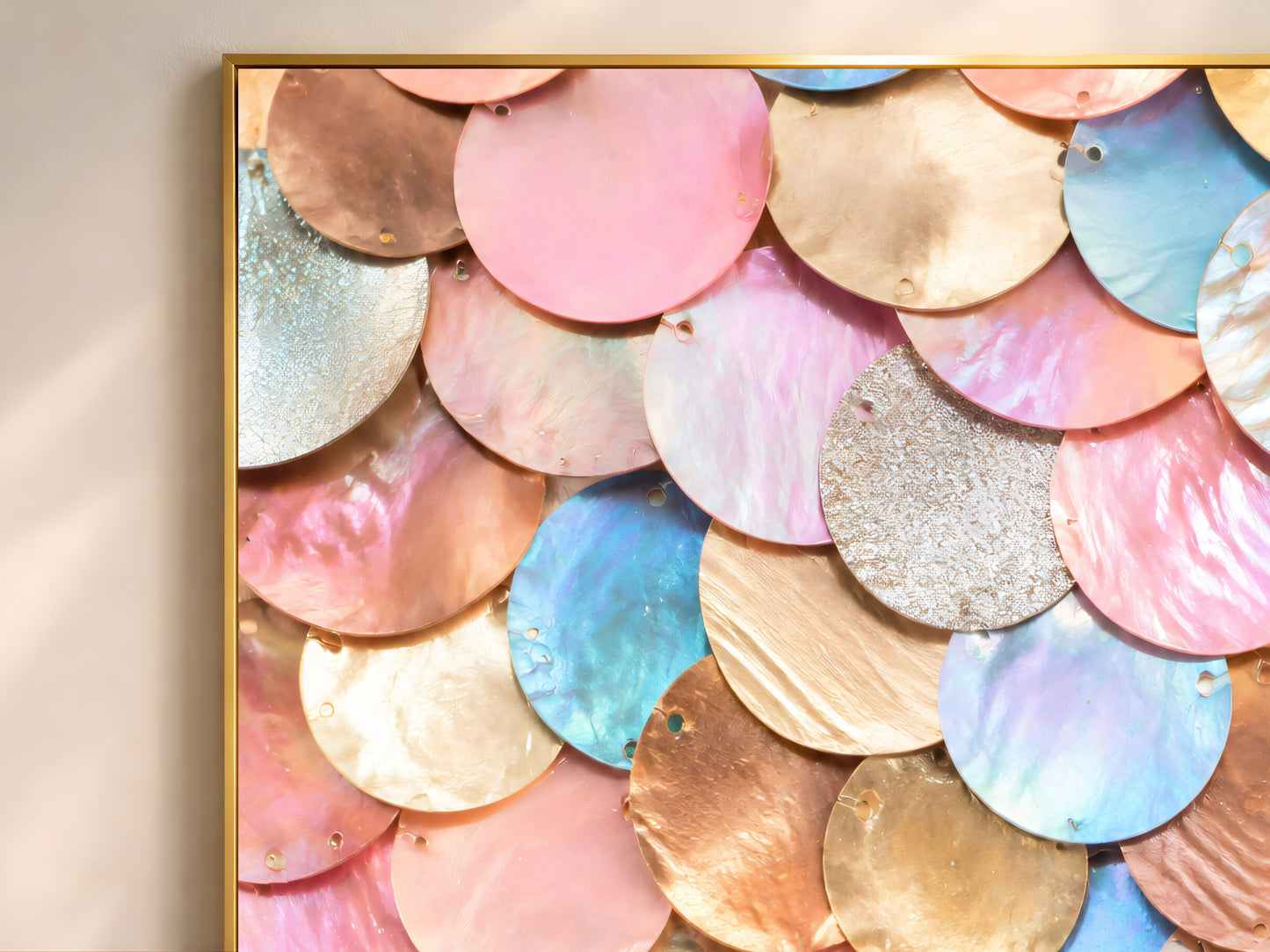 Close-up of jewel tone mermaid scale print showing rose gold, blush pink, and teal scalloped texture