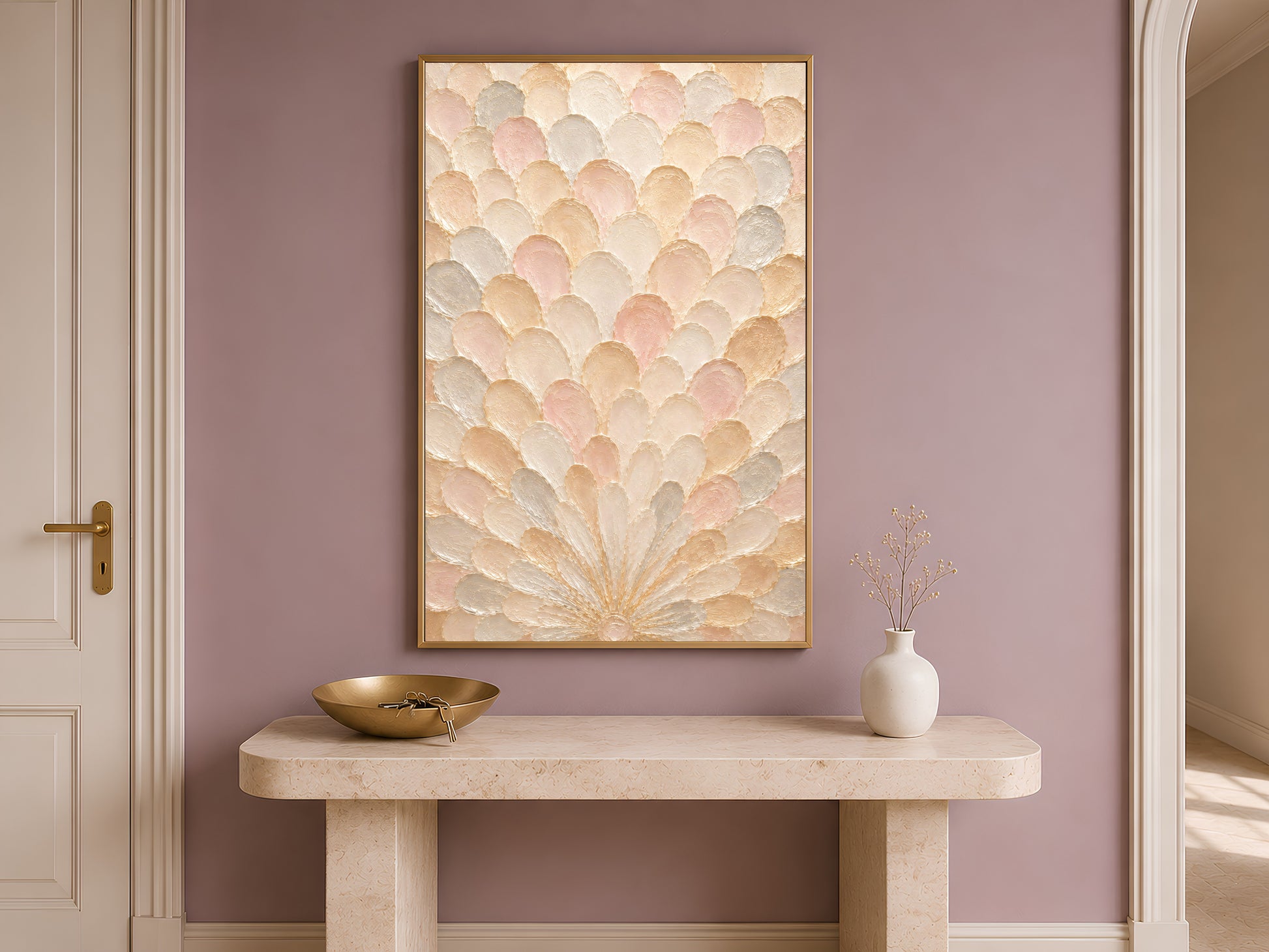 Framed sunburst capiz shell wall art above a console table beside an arched doorway

