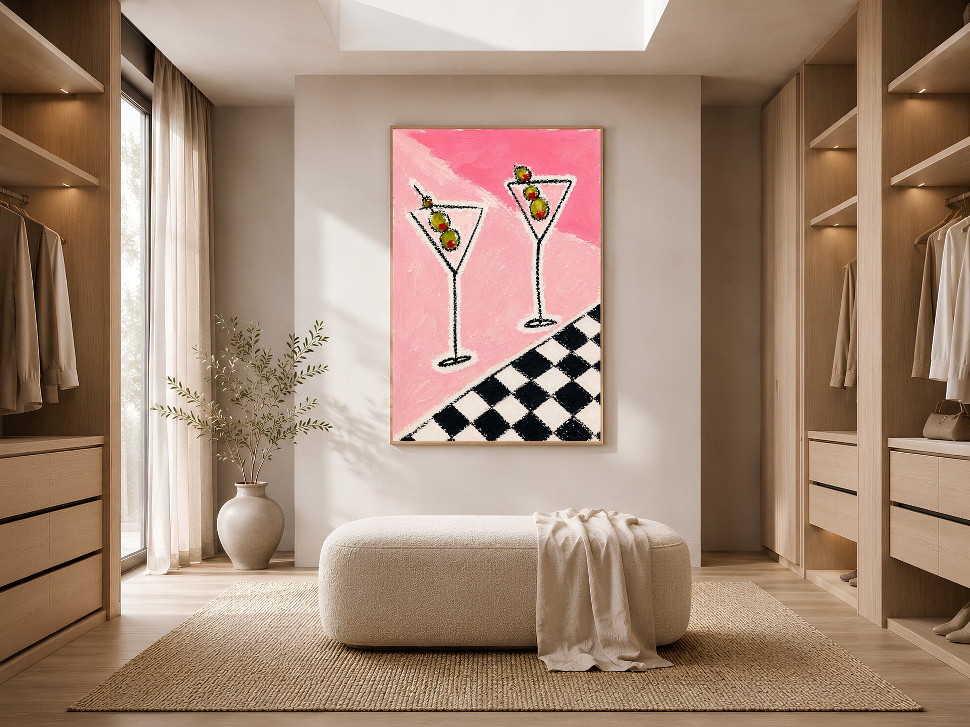 Large framed impasto martini print leaning against white wardrobe wall in bright minimal dressing room with ottoman
