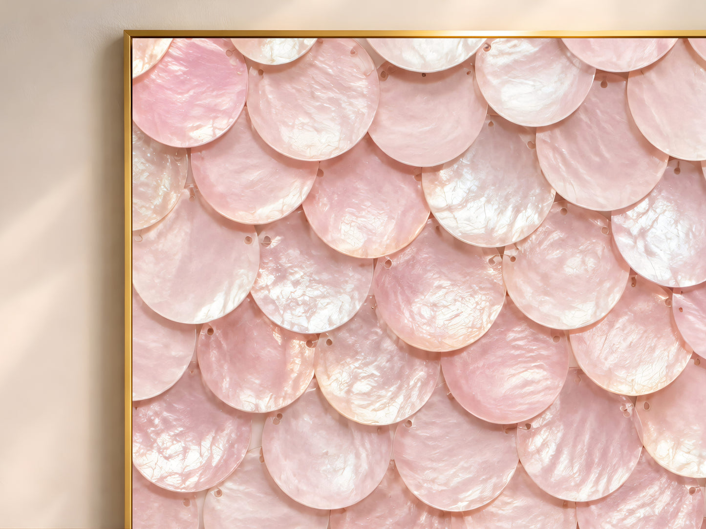 Close-up of blush pink mermaid scale print showing iridescent pearl and dusty rose scalloped texture