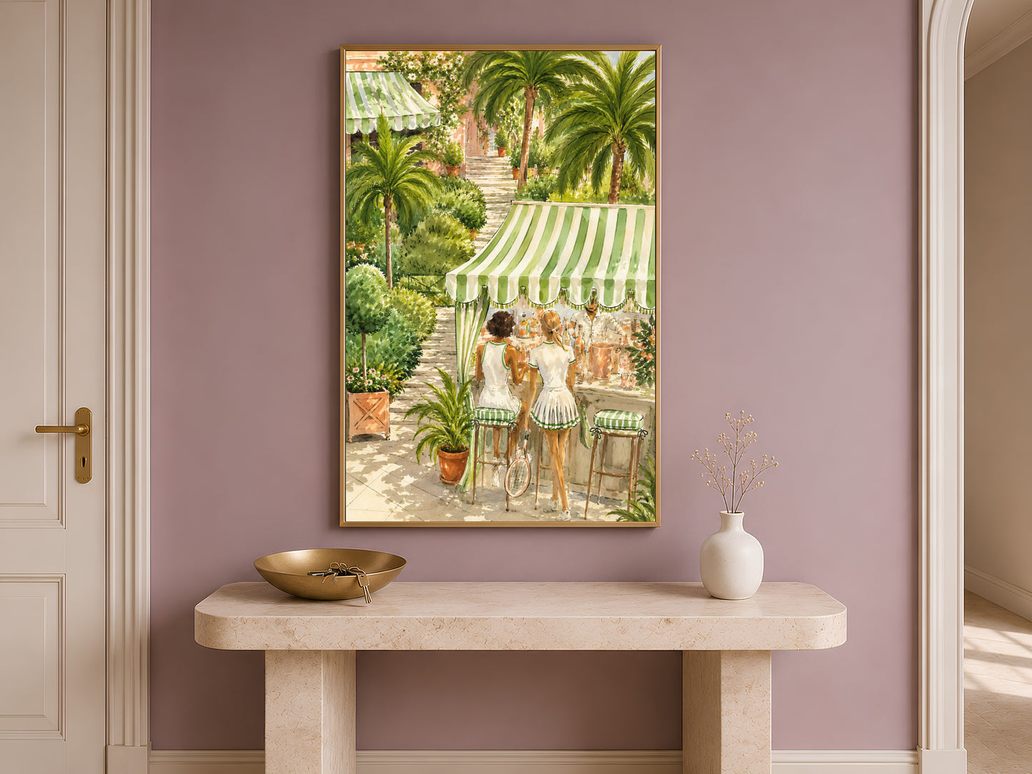 Framed tennis club watercolor print above a console table with a vase in a bright entryway.