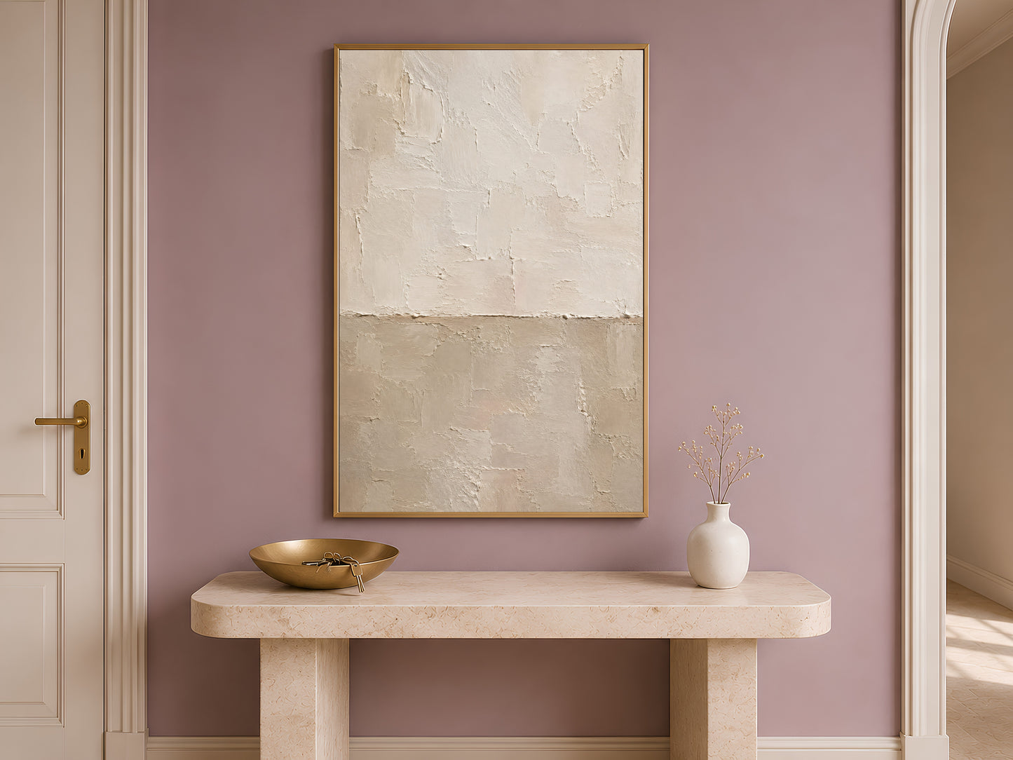 Wabi sabi wall art framed above a wooden entryway console table with a small vase
