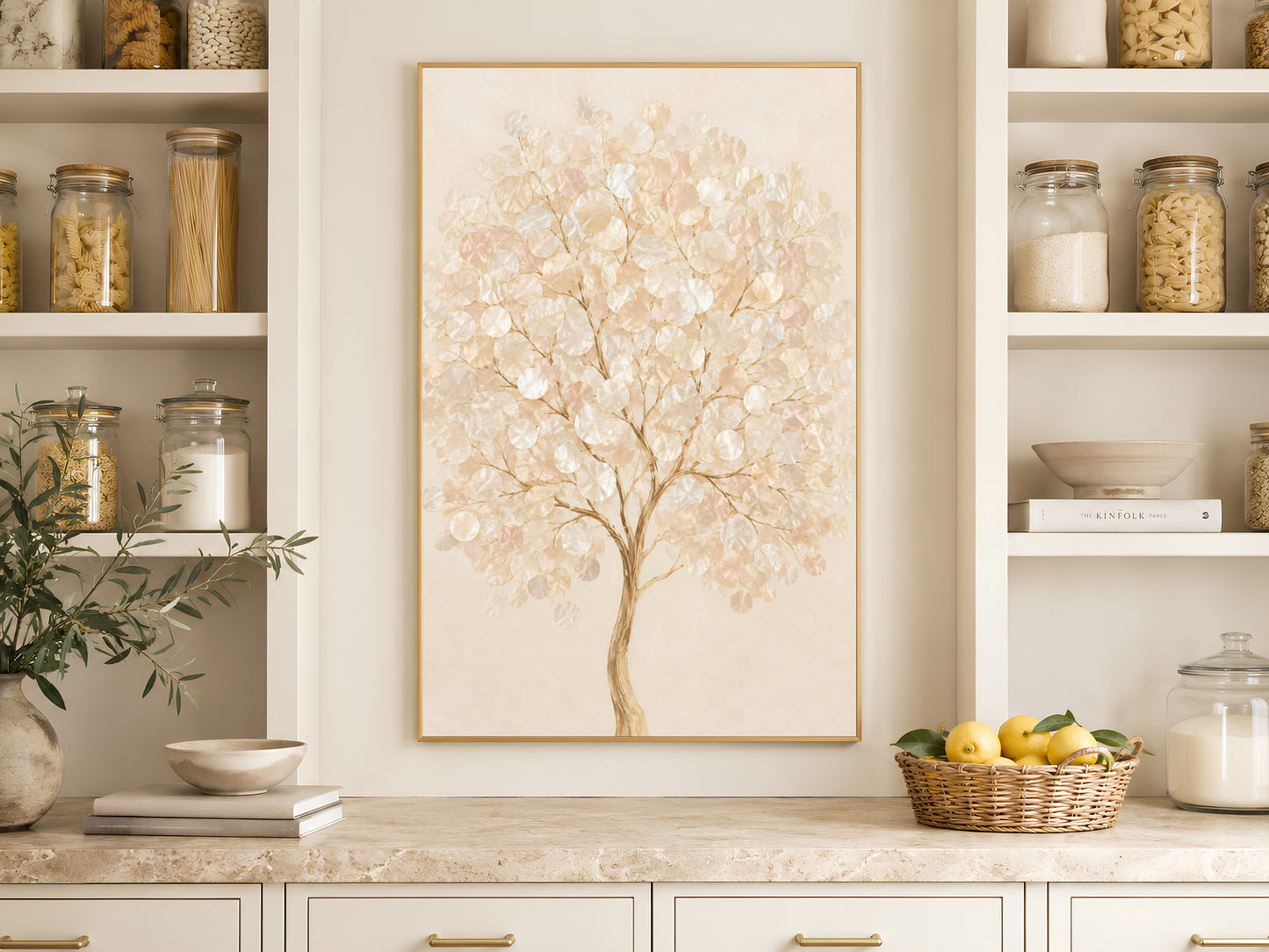 Capiz shell tree art framed on a kitchen wall beside open shelving and pantry jars