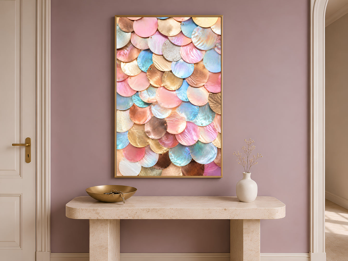Jewel tone mermaid scale wall art framed above a console table in a warm entryway