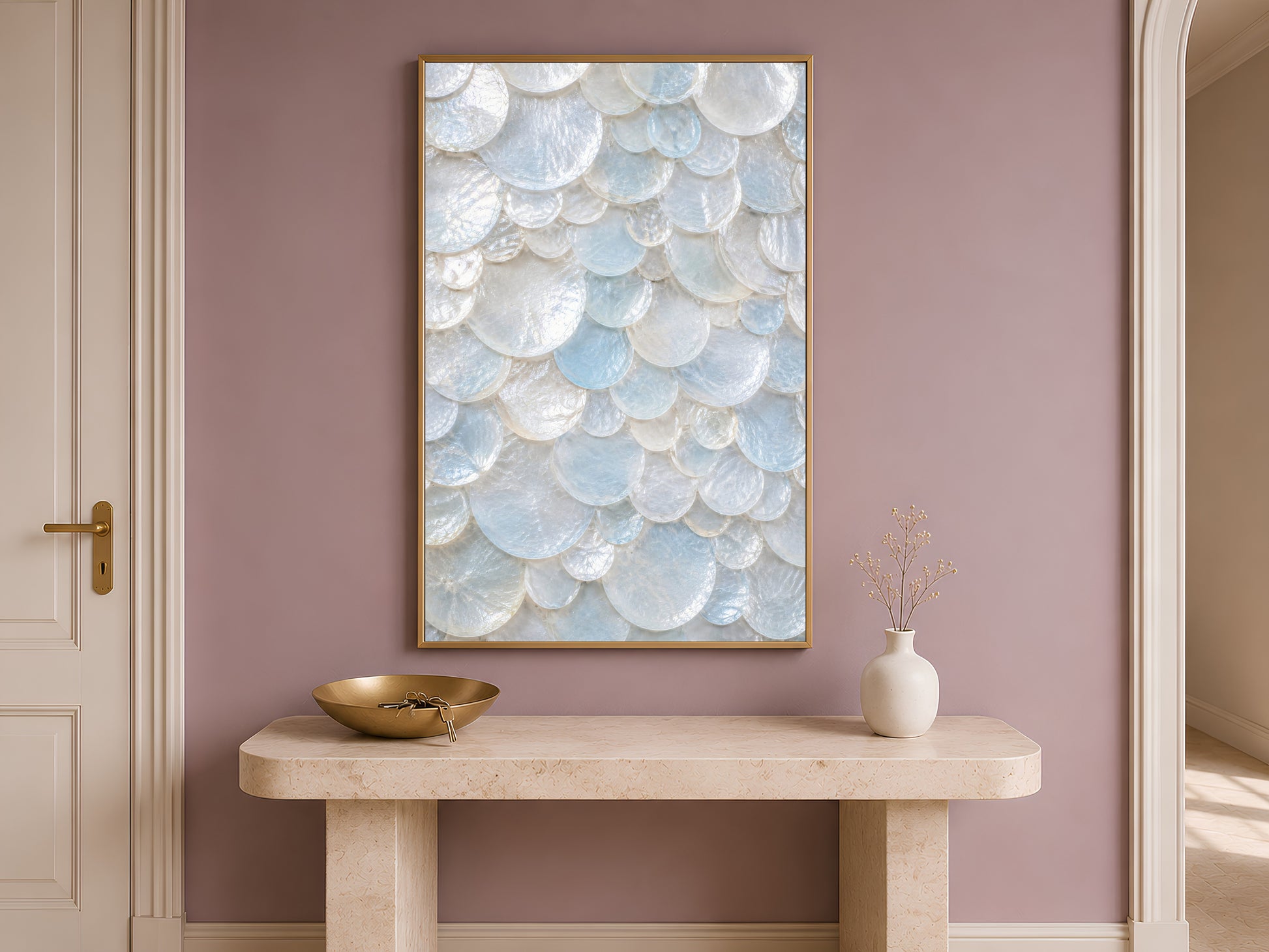 Sunlit arched hallway with a console table, fresh flowers, and a framed aqua sea glass print on the mauve wall.