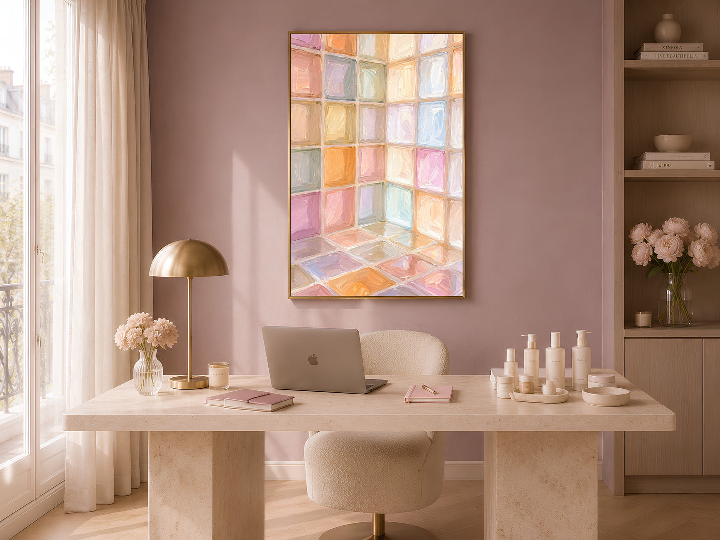 Rainbow pastel mosaic tile wall art in gold frame in bright home office above white desk with lamp and vases
