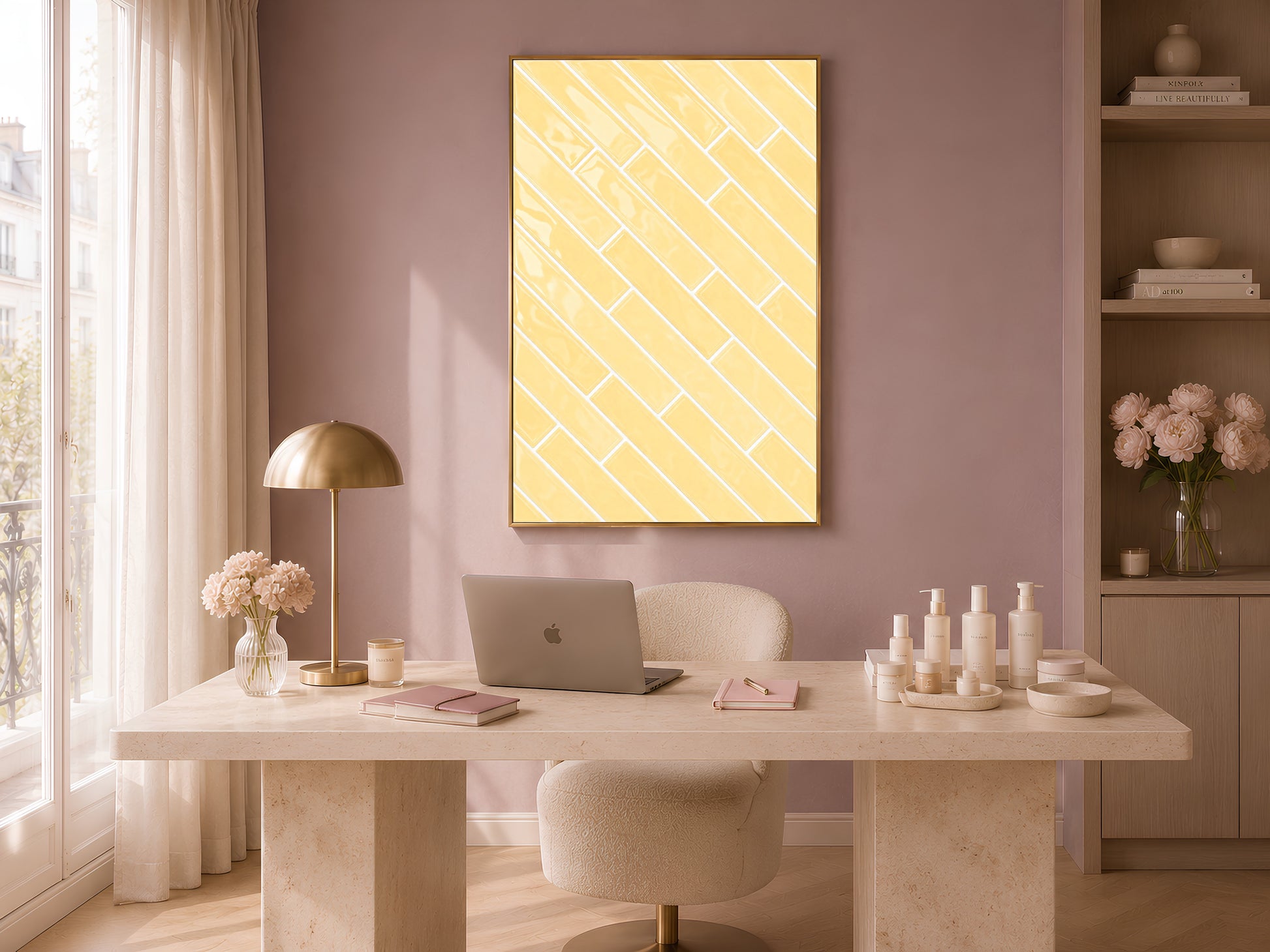 Butter yellow tile print in a natural wood frame displayed in a soft feminine home office with a travertine desk, gold lamp, and dusty pink shelving