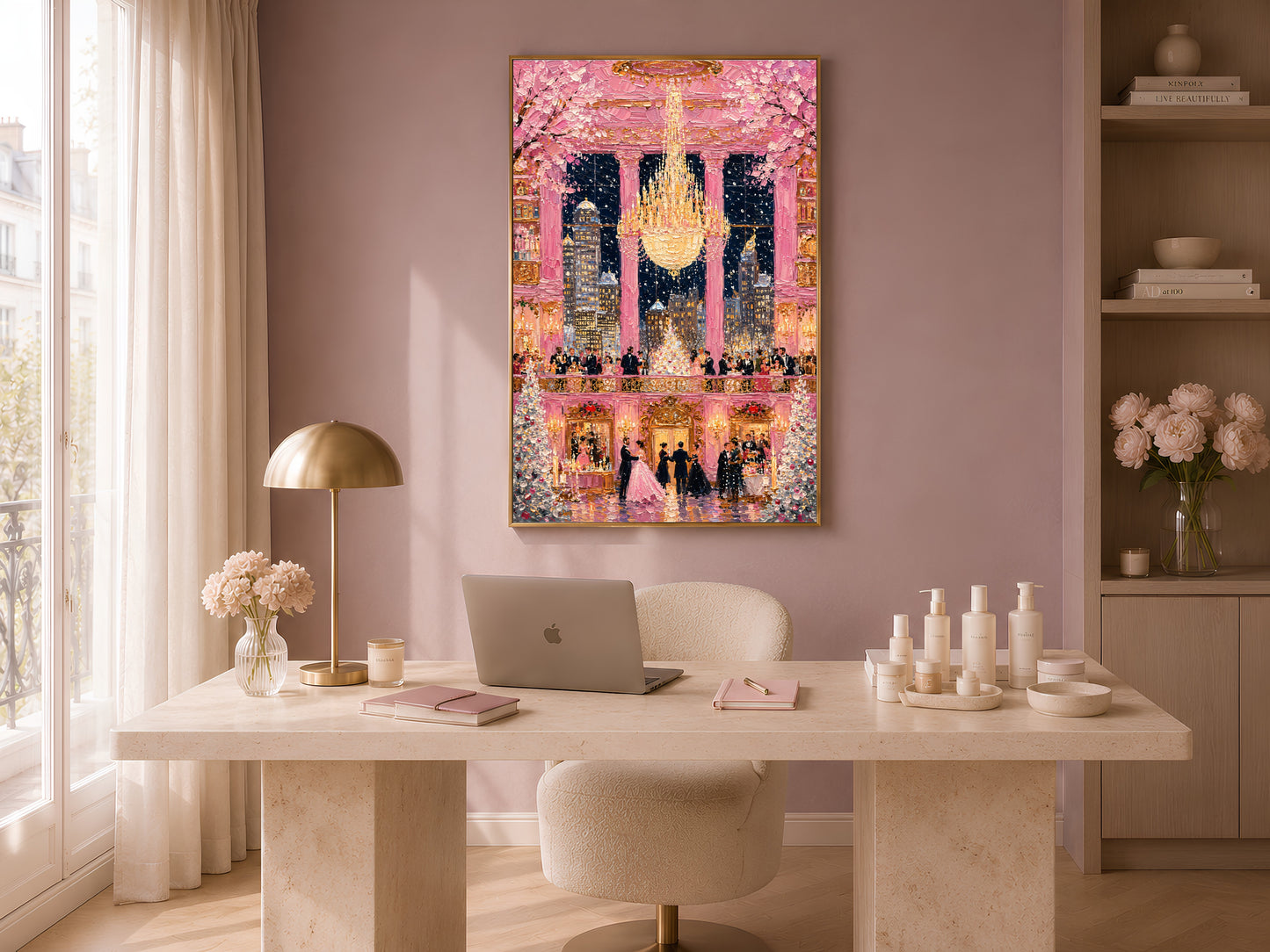 Pink ballroom chandelier gala wall art in gold frame in warm home office above white desk with lamp and candles
