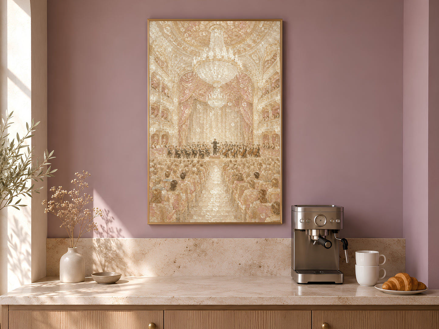 Orchestra hall print framed in gold displayed above kitchen counter near coffee machine
