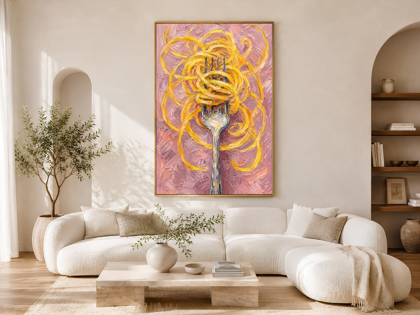 Pasta wall art in a wood frame styled above a cream curved sofa in a bright minimalist living room with warm wood coffee table and olive tree
