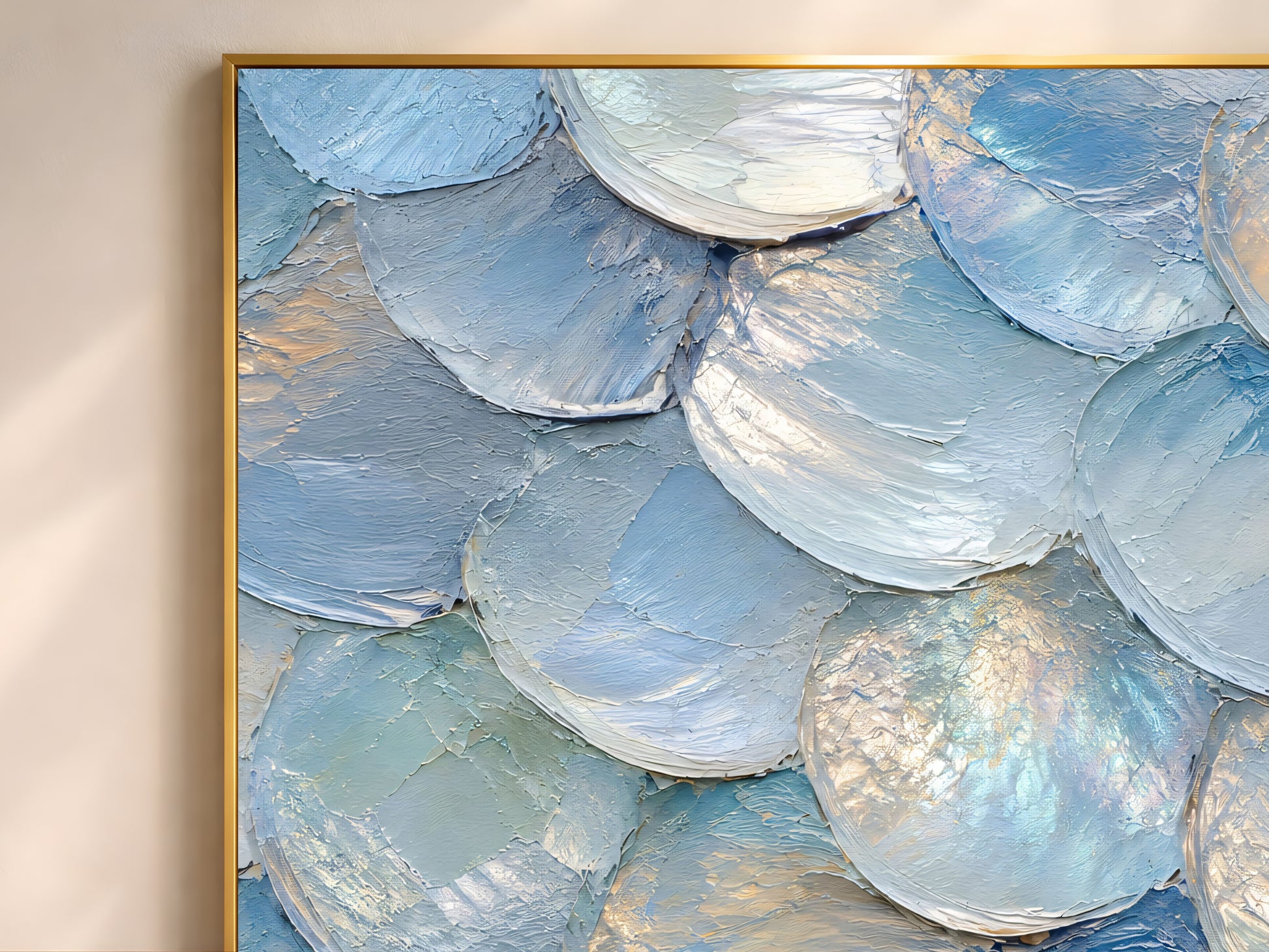 Close up of iridescent capiz shell wall art showing layered impasto texture and pearl shine
