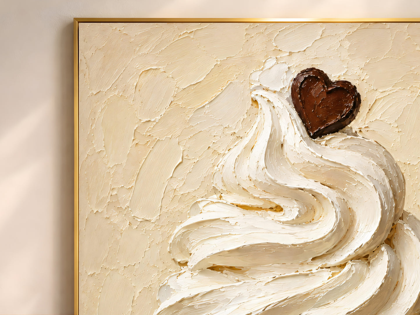 Close-up detail of ice cream wall art in a gold frame showing thick impasto brushwork in warm cream, honey gold, and amber tones with a chocolate heart accent
