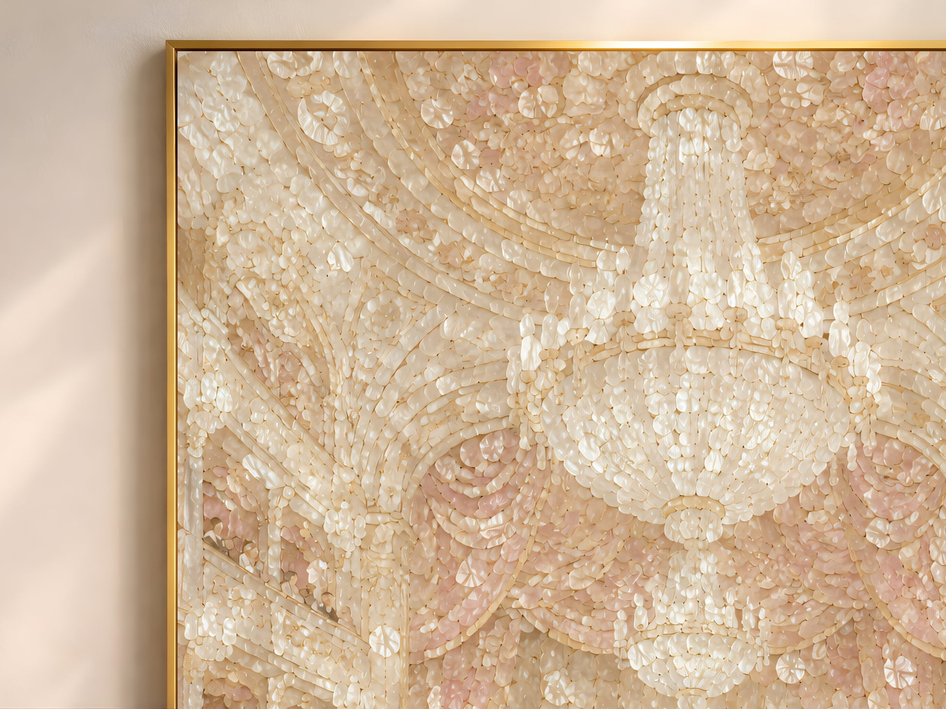 Close up of pearl ivory concert hall wall art showing capiz shell mosaic texture and chandelier
