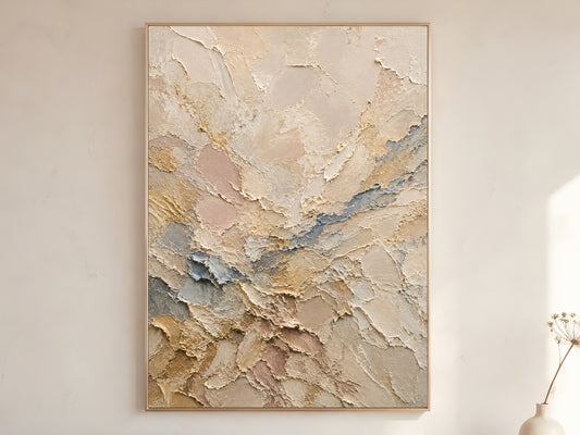 Close-up detail of neutral abstract impasto wall art print showing warm ivory palette knife texture with blush pink and slate blue accents in a gold frame
