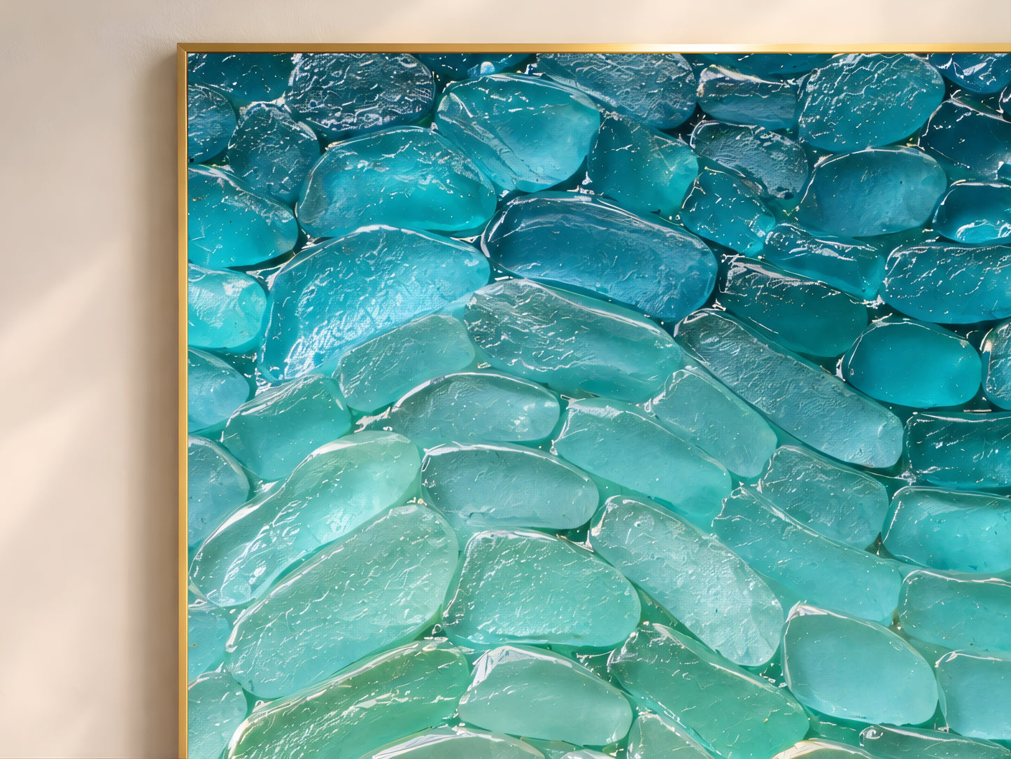 Close up detail of sea glass wall art showing teal cobalt seafoam and white frosted glass wave pattern