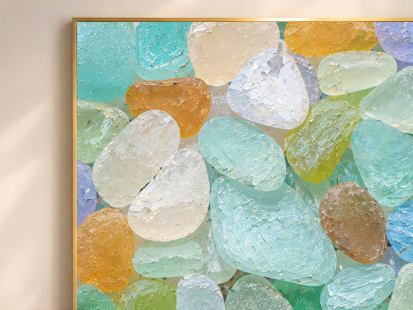 Close up of colorful sea glass wall art showing mint teal lavender amber and white frosted glass pieces