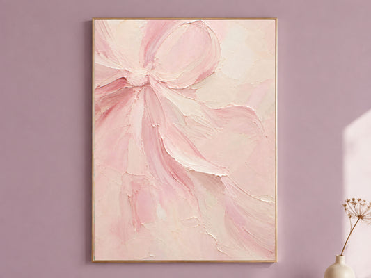 Framed blush pink textured impasto bow oil painting print hanging on a dusty mauve wall